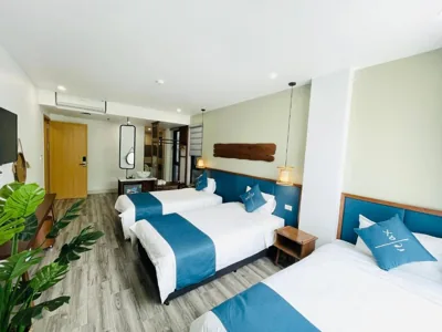 Camera Deluxe tripla — The Light Hotel