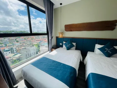 Camera Superior doppia o twin con vista città — The Light Hotel